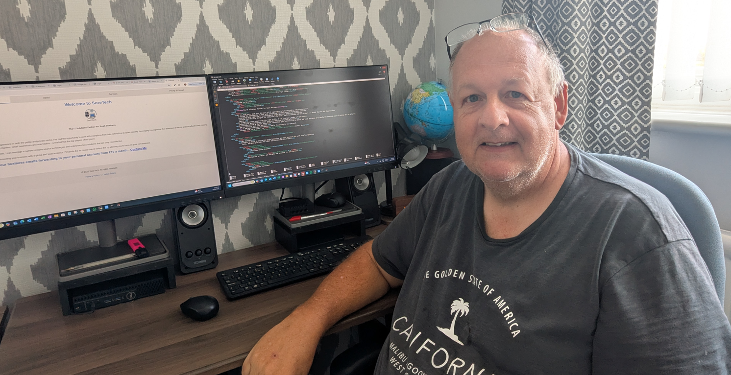 Andy Sore at his desk